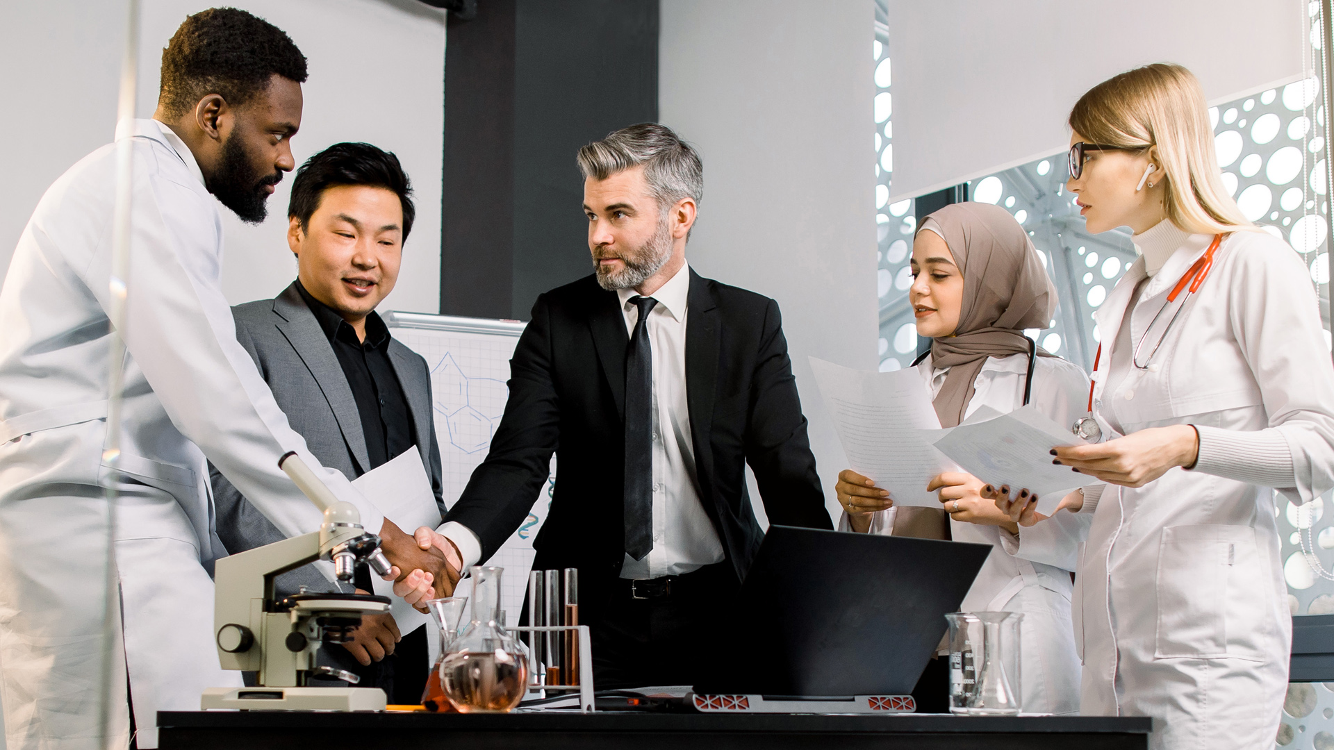 scientists meeting in a lab